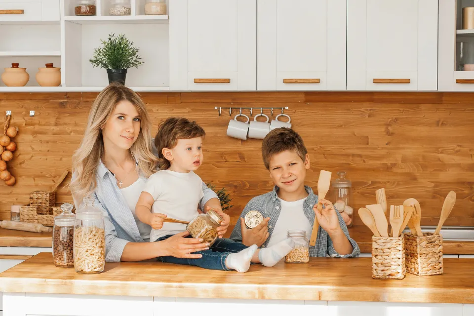 Leena and her kids cooking – Blog values Leena cooking with her two children, capturing the spirit of sharing, love, and family traditions in the kitchen.